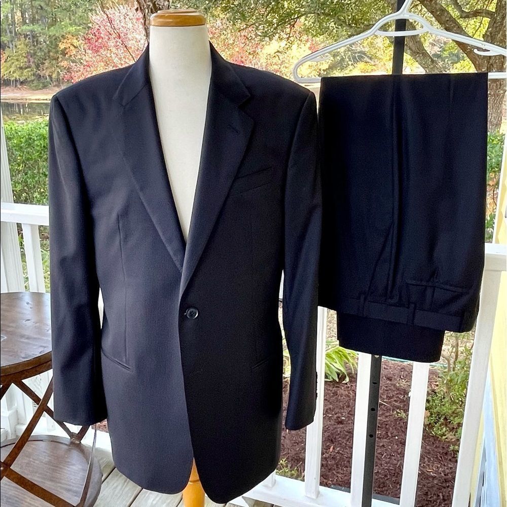 Armani 2 Button Dark Blue Suit. Size 42L. Sold at Saks Fifth Avenue Store.